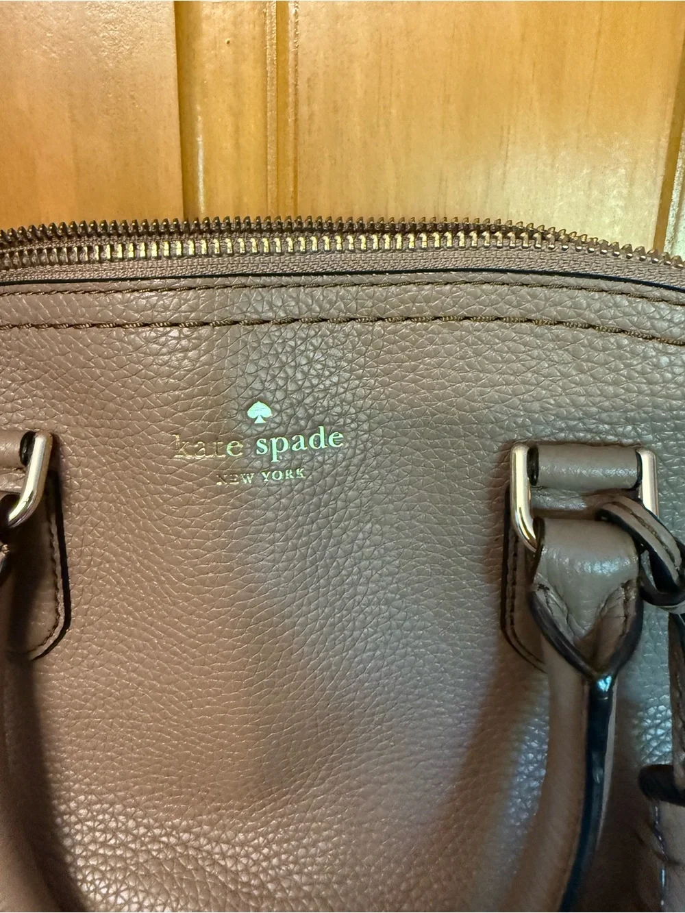 kate spade McCall Street Carli taupe pebbled leather dome tassel satchel